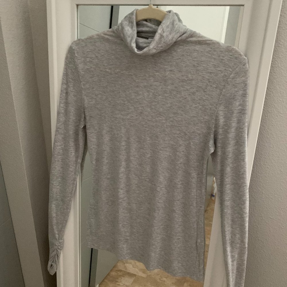 Grey turtleneck with ruched sleeves
